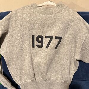 Essentials Heather Gray Crewneck Sweater with 1977 Print